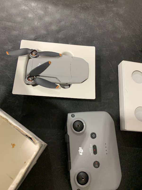 Photo 1 of DJI Mini 2 SE, Lightweight Mini Drone with QHD Video, 10km Max Video Transmission, 31-Min Flight Time, Under 249 g, Auto Return to Home, 3-Axis Gimbal Drone with Camera for Beginners