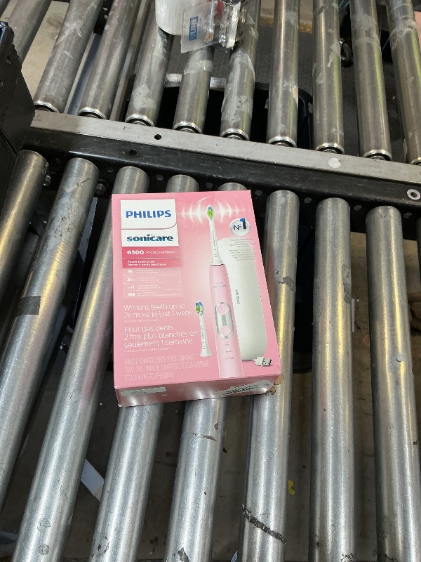 Photo 1 of Philips Sonicare ProtectiveClean 6500 Rechargeable Electric Toothbrush, with Pressure Sensor, 3 Cleaning Modes, SmarTimer and QuadPacer, 14-Day Battery Life, Charging Travel Case, Pink, HX6462/06