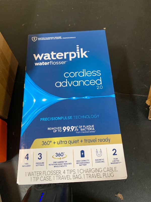 Photo 1 of Waterpik Cordless Advanced 2.0 Water Flosser For Teeth, Gums, Braces, Dental Care With Travel Bag and 4 Tips, ADA Accepted, Rechargeable, Portable, and Waterproof, White WP-580, Packaging May Vary