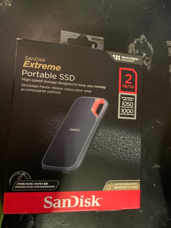 Photo 1 of SANDISK 2TB Extreme Portable SSD (Old Model) - Up to 1050MB/s, USB-C, USB 3.2 Gen 2, IP65 Water and Dust Resistance, Updated Firmware - External Solid State Drive - SDSSDE61-2T00-G25