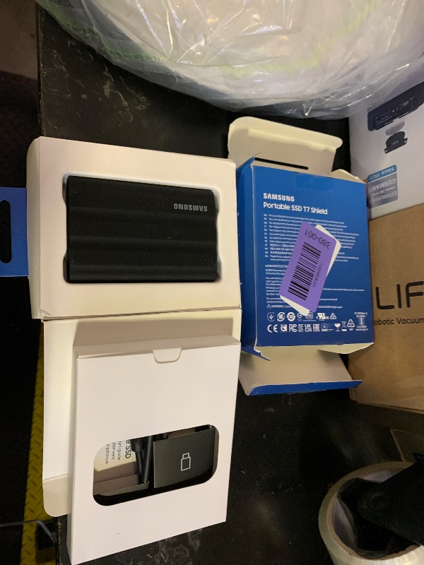 Photo 1 of Samsung T7 Shield 2TB, Portable SSD, up-to 1050MB/s, USB 3.2 Gen2, Rugged,IP65 Water & Dust Resistant, for Photographers, Content Creators and Gaming, Extenal Solid State Drive (MU-PE2T0S/AM), Black