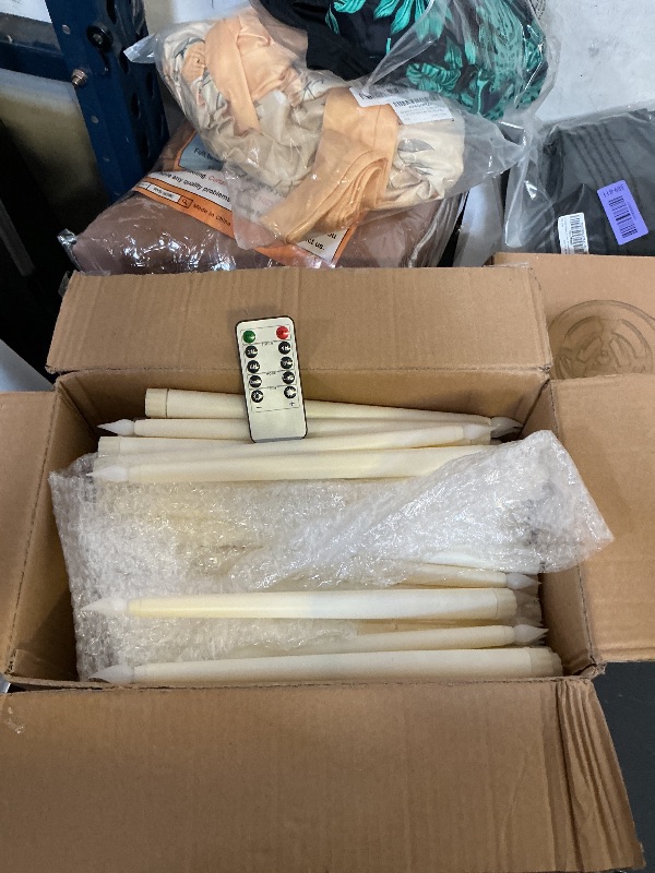 Photo 1 of Baquler 120 Pcs Flameless Taper Candles with Remote and Timer 11" Battery Operated Candlesticks LED Flickering Faux Candles Warm Light for Wedding Holiday Party Home Decor