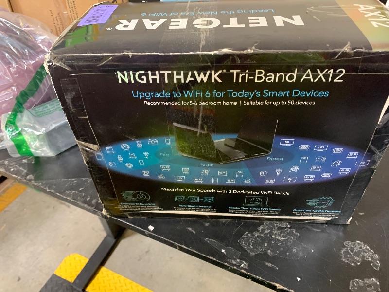 Photo 1 of NETGEAR Nighthawk WiFi 6 Router (RAX200) 12-Stream Gigabit Router AX11000 Tri-Band Wireless Speed (Up to 10.8 Gbps) Coverage Up to 2500 sq.ft. and 50 Devices