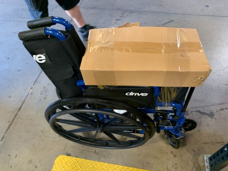 Photo 1 of Drive Medical Blue Streak Lightweight Foldable Wheelchair - Enhanced Mobility Support - Durable Construction - Padded Comfort - Swing-Away Leg Rests - Desk Arms - Blue/Black - 16 Inch Seat