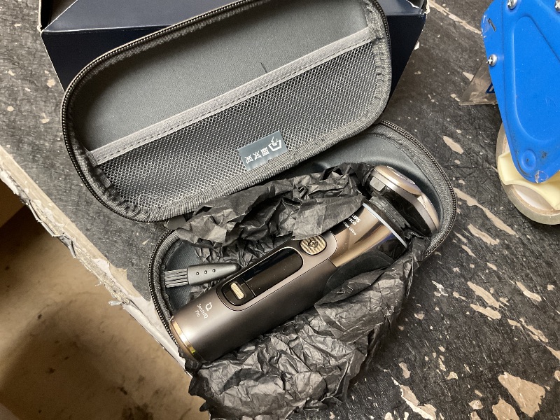 View 4 of Philips Norelco Shaver i9000 Prestige Ultra, Wet & Dry Electric Shaver, Dark Slate, SenseIQ Pro Technology, Triple Lift & Cut System, 360 Rotating NanoTech Precision Blades, Quick Clean Pod, XP9402/86