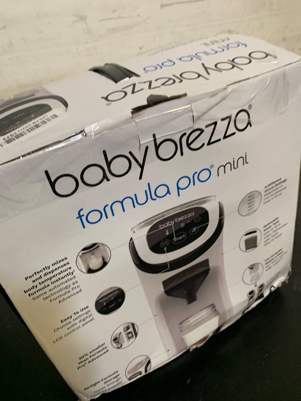 Photo 1 of Baby Brezza Formula Pro Mini Baby Formula Mixer Machine Fits Small Spaces and is Portable for Travel– Bottle Makers Makes The Perfect Bottle for Your Infant On The Go, White