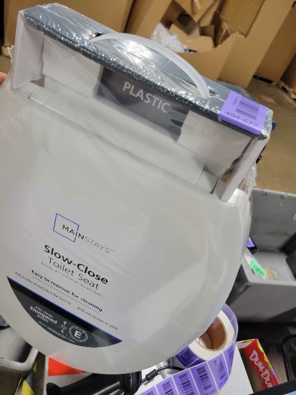 Photo 1 of  Mainstays Plastic Elongated Slow-Close Toilet Seat in White 