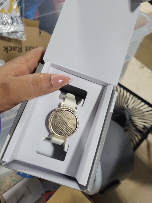 Photo 1 of Garmin Lily 2, Small and Stylish Smartwatch, Hidden Display, Patterned Lens, Up to 5 Days Battery Life, Coconut