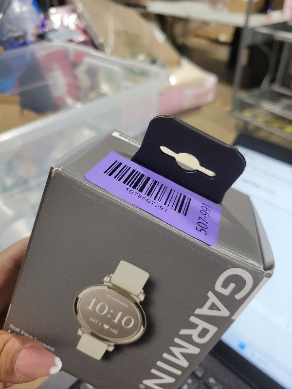 Photo 1 of Garmin Lily 2, Small and Stylish Smartwatch, Hidden Display, Patterned Lens, Up to 5 Days Battery Life, Coconut
