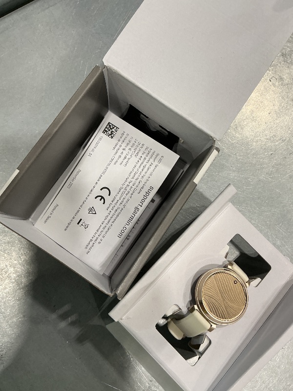 Photo 1 of Garmin Lily 2, Small and Stylish Smartwatch, Hidden Display, Patterned Lens, Up to 5 Days Battery Life, Coconut