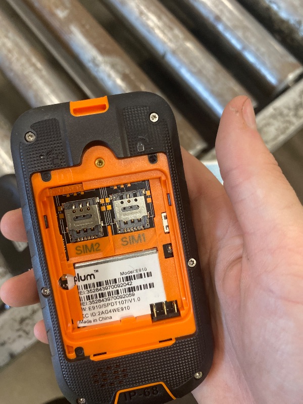 Photo 1 of **MISSING COMPONENTS, FOR PARTS ONLY** Plum RAM Plus 4G Volte Rugged Flip Phone, Shock Resistent, T-Mobile - Orange