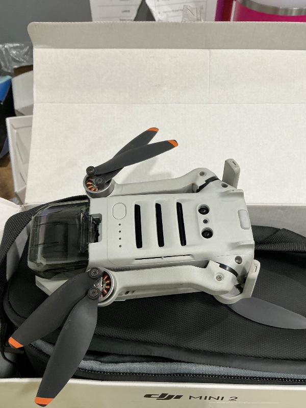 Photo 1 of **USED MAY HAVE ISSUES WITH FUNCTIONALITY**

DJI Mini 2 Fly More Combo – Ultralight Foldable Drone, 3-Axis Gimbal with 4K Camera, 12MP Photos, 31 Mins Flight Time, OcuSync 2.0 10km HD Video Transmission, QuickShots, Gray (CP.MA.00000306.01)