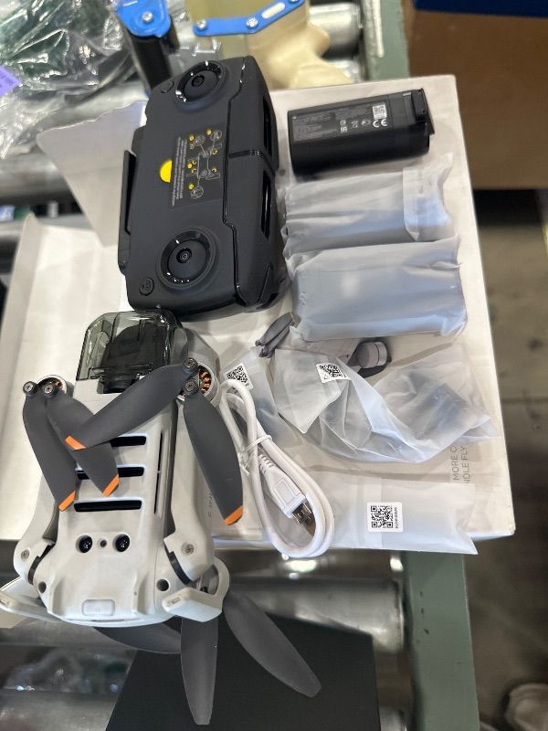 Photo 1 of **USED MAY HAVE ISSUES WITH FUNCTIONALITY**

DJI Mini 2 Fly More Combo – Ultralight Foldable Drone, 3-Axis Gimbal with 4K Camera, 12MP Photos, 31 Mins Flight Time, OcuSync 2.0 10km HD Video Transmission, QuickShots, Gray (CP.MA.00000306.01)