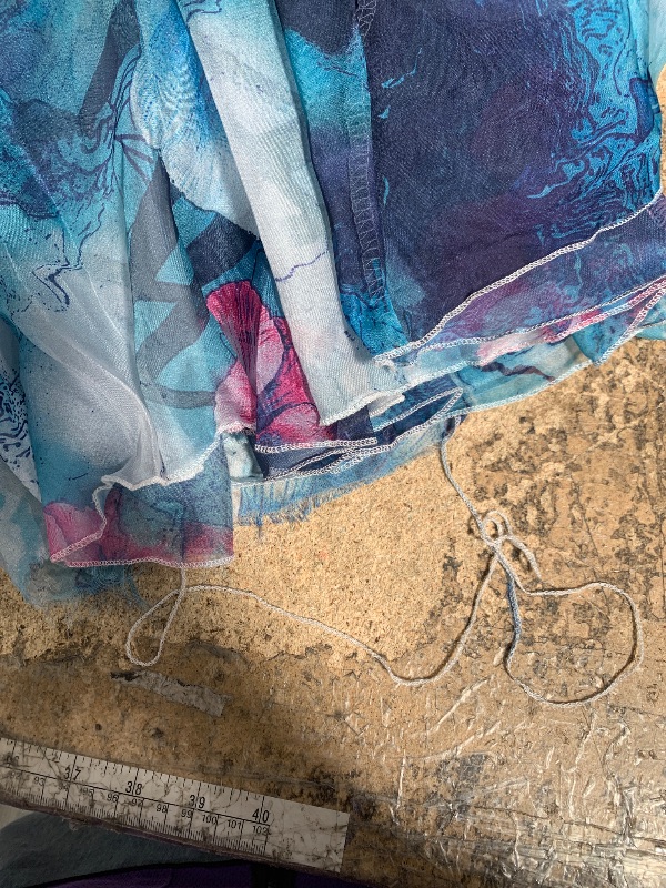 Photo 1 of **DAMAGE SHOWN IN SECOND PHOTO** Blue floral skirt Size medium