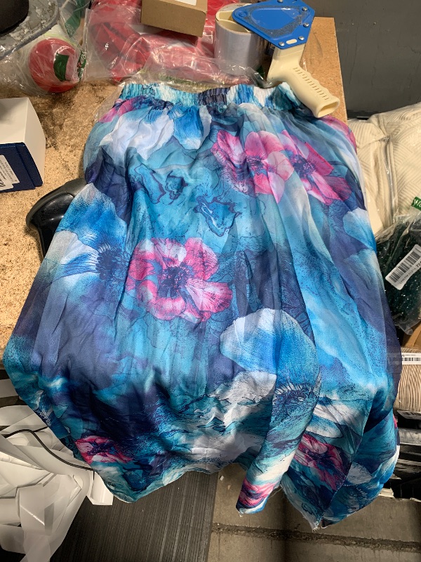 Photo 1 of **DAMAGE SHOWN IN SECOND PHOTO** Blue floral skirt Size medium
