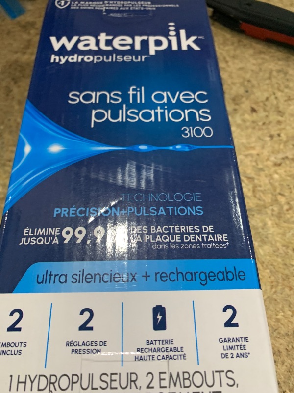 Photo 1 of ***MISSING CHARGER***Waterpik Cordless Pulse 3100 Rechargeable Portable Water Flosser for Teeth, Gums, Braces Care and Travel with 2 Flossing Tips, Waterproof for Shower Use, ADA Accepted, WF-20 White, Amazon Exclusive
