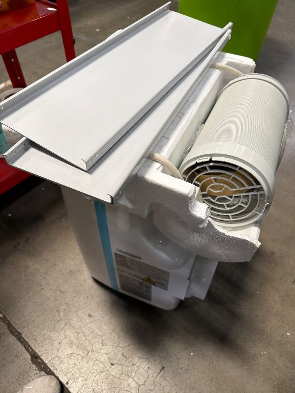 Photo 1 of **DOESNT BLOW COLD AIR** BLACK+DECKER Portable Air Conditioner, 10,000 BTU, BPACT10WT, White