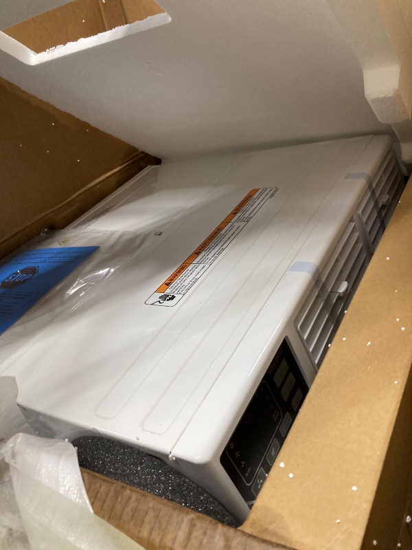 Photo 1 of ***DAMAGED-NON-FUNCTIONAL SELLING AS PARTS ONLY***------ Whirlpool 12,000 BTU 230V Through-the-Wall Air Conditioner and Dehumidifier with Remote Control, Wall AC Unit for Apartment, Living Room and Medium Rooms up to 550 Square Feet in White***DAMAGED-NON