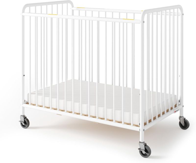 Photo 1 of . Baby Deluxe Holiday Mini/Portable Folding Metal Crib, White