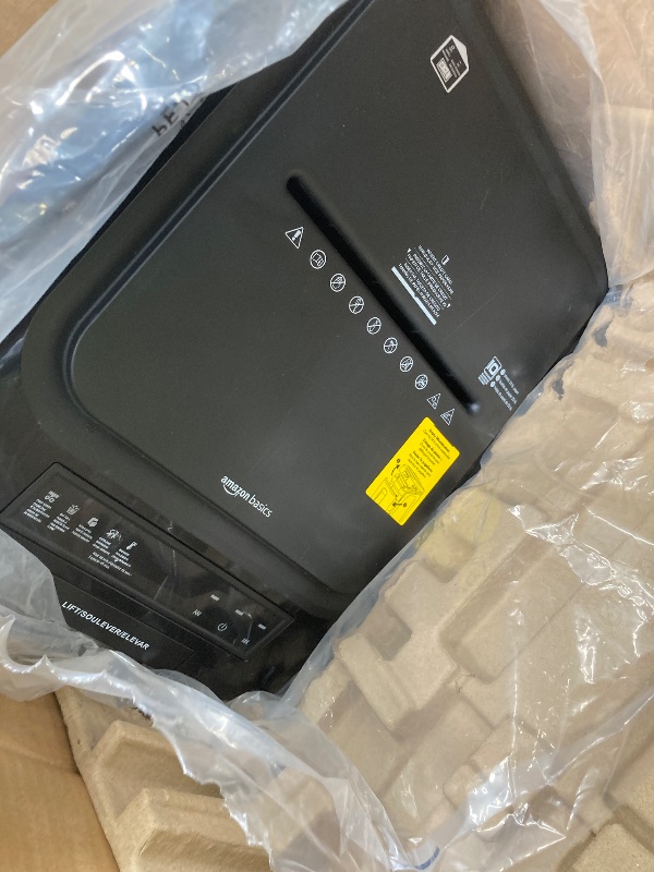 Photo 1 of *scratches* Amazon Basics 200-Sheet Auto Feed Cross-Cut Paper Shredder, High Security P-4, Anti-Jam, 8.5 Gallon Pullout Bin, Black