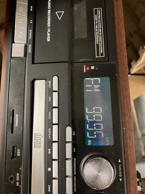 Photo 1 of **CRACKED LID/NOT ALL PARTS WORK***9-in-1 Record Player Bluetooth Turntable with Built-in Stereo Speakers, AM/FM Radio, CD & Cassette Player, USB/SD Playback, Remote Control for Vinyl Lovers and Music Enthusiasts