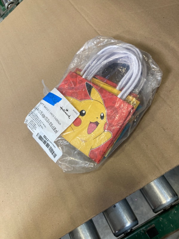 Photo 1 of Hallmark Pokémon 4" Mini Gift Bags (18 Bags: Pikachu, Charizard, Gengar, Eevee) for Birthday Party Favors, Gift Cards, Classroom Treats