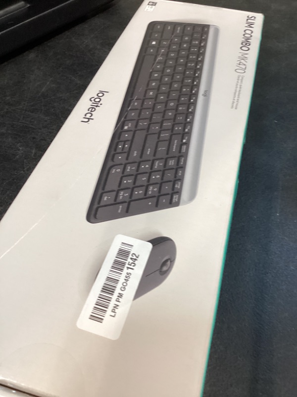 Photo 1 of Logitech MK470 Slim Wireless Keyboard and Mouse Combo - Modern Compact Layout, Ultra Quiet, 2.4 GHz USB Receiver, Plug n' Play Connectivity, Compatible with Windows - Graphite