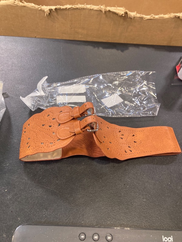 Photo 1 of WOMEN'S BROWN BELT SIZE MEDIUM