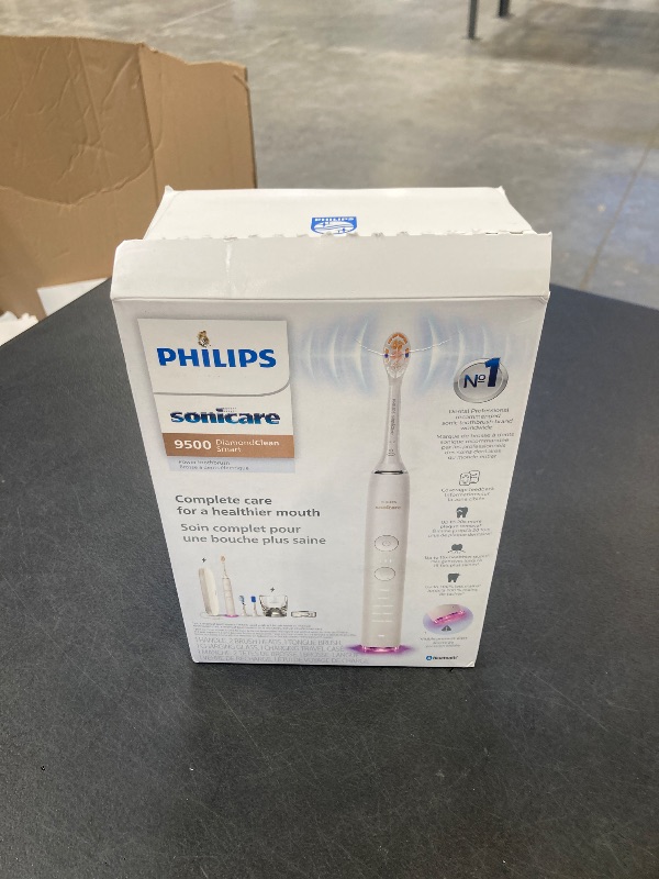 Photo 1 of Philips Sonicare DiamondClean Smart 9500 Electric Toothbrush - Sonic Toothbrush with App, Pressure Sensor, 15 Brushing Settings, Replacement Reminder, USB Charging Travel Case, White, Model HX9923/01