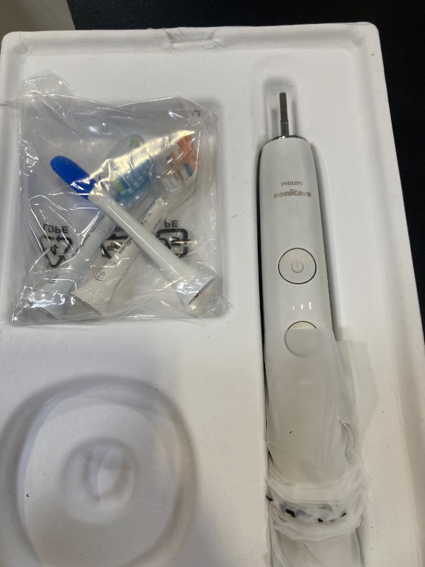 Photo 1 of Philips Sonicare DiamondClean Smart 9500 Electric Toothbrush - Sonic Toothbrush with App, Pressure Sensor, 15 Brushing Settings, Replacement Reminder, USB Charging Travel Case, White, Model HX9923/01