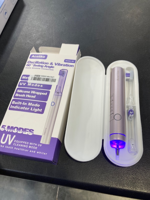 Photo 1 of Metal Electric Toothbrush with UV Mode, Vibration and Oscillation Electric Toothbrush for Adults, 6 Brush Heads & Travel Case & Dust Cover, 5 Modes & Built in Timer, One Charge Last 120 Day?Rose?