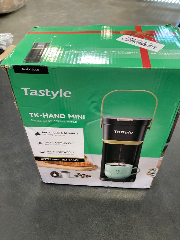 Photo 1 of Tastyle Single Serve One Cup Coffee Maker, for K Cups and Grounds, Mini Coffee Maker with Portable Handle, 6 to 12 Oz Brew Size, for Travel, Camping, Office, RV and Dorm, 120V, Black and Gold