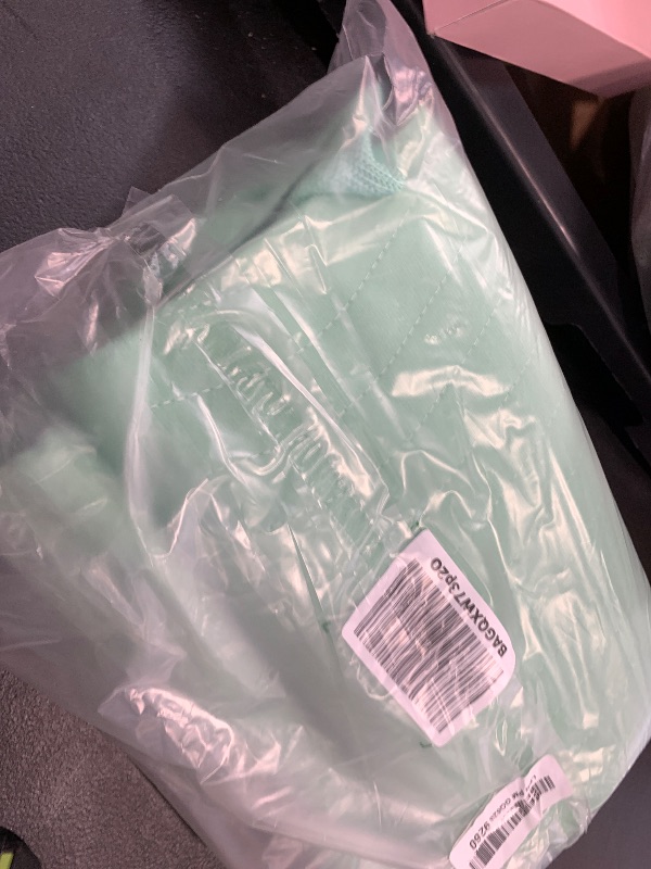 Photo 1 of Improvia Positioning Bed Pad, with 8 Reinforced Handles, Quick-Drying, Washable, Waterproof, for Lifting, Turning, Transfering, Elderly and Incontinence Patients (Green, 34" x 52" - Pack of 1)
