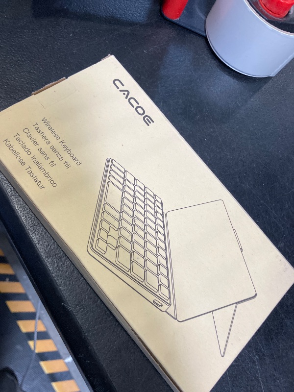 Photo 1 of CACOE Wireless Keyboard with Stand, Mini Keyboard for Cell Phone, Ultra-Slim Portable, Foldable, Dual-Channel QWERTY with Stand Holder for Smartphone and More iOS Android Windows, Grey
