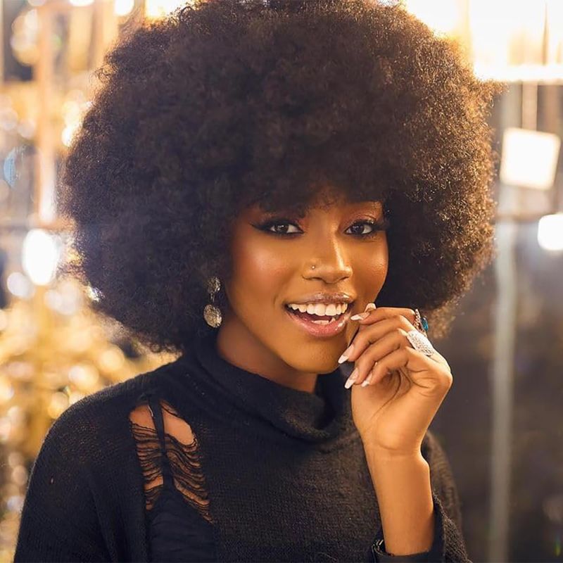 Photo 1 of 70's Afro Wig for Women, Natural Black Short Afro Kinky Curly Wig, Glueless Synthetic Wig with Bangs, Puffy & Fluffy Bouncy Afro Wig for Daily Cosplay Party