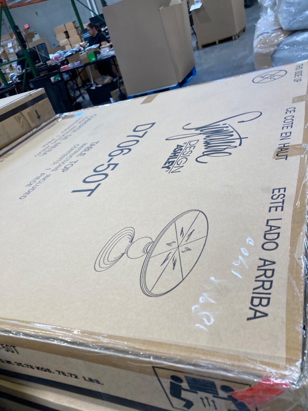 Photo 1 of Ashley Shatayne Dining Table D706-50T-50B---------PLEASE BRING TRUCK UPON PICK UP ITEM IS XL --------FACTORY SEALED 
