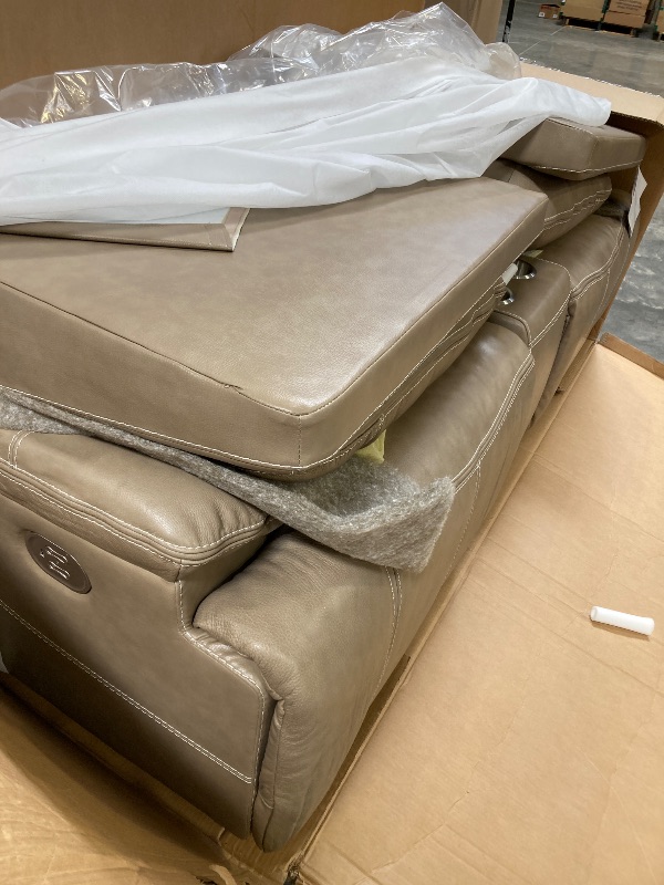 Photo 1 of Signature Design by Ashley Ricmen Leather Adjustable Dual Sided Power Reclining Loveseat with USB Charging & Console, Light Brown----FACTORY SEALED -----PLEASE BRING TRUCK UPON PICK UP ITEM IS XL