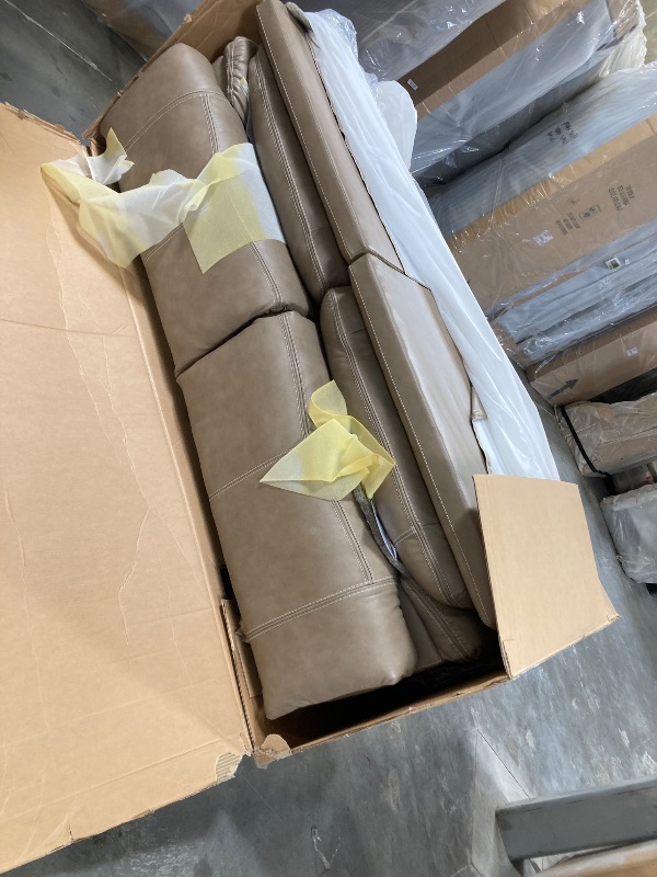 Photo 1 of Signature Design by Ashley Ricmen Leather Adjustable 2 Seat Power Reclining Sofa with USB Charging, Light Brown----FACTORY SEALED -----PLEASE BRING TRUCK UPON PICK UP ITEM IS XL