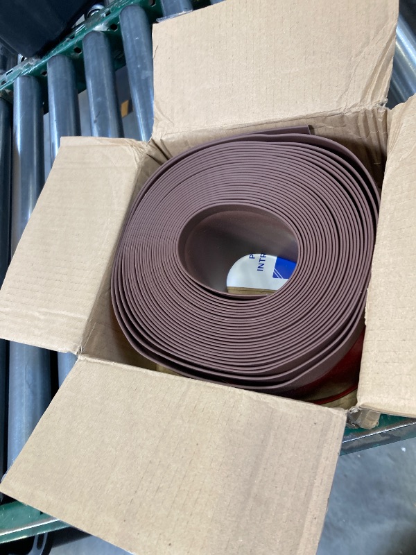 Photo 1 of Vinyl Wall Base Baseboard Molding Trim 4" Flexible Self Adhesive Rubber Wall Base Moulding Trim Peel and Stick Design, 4 Inch x 40 Feet, Brown