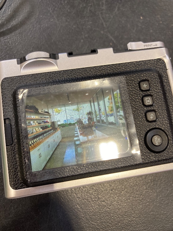 Photo 1 of Fujifilm Instax Mini EVO Instant Camera
