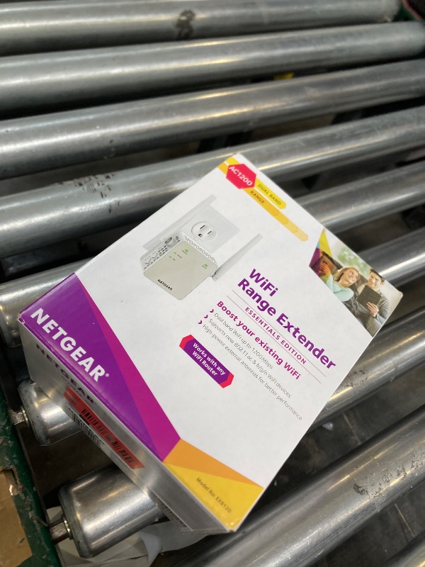 Photo 1 of NETGEAR WiFi Range Extender (EX6120) - Add up to 1,500 sq. ft., 25 Devices - AC1200 Dual Band Wireless Signal Extender (Up to 1.2 Gbps Speed), Compact Wall Plug Design – Free Expert Help