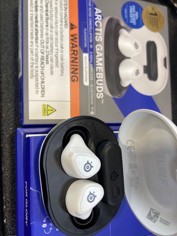Photo 1 of SteelSeries Arctis GameBuds for PlayStation/PC/Switch/Mobile — 2.4GHz + Bluetooth 5.3 Earbuds — ANC — Mobile App Sound Presets — Water Resistant IP55 — 40H Battery with Qi Charging Case - White