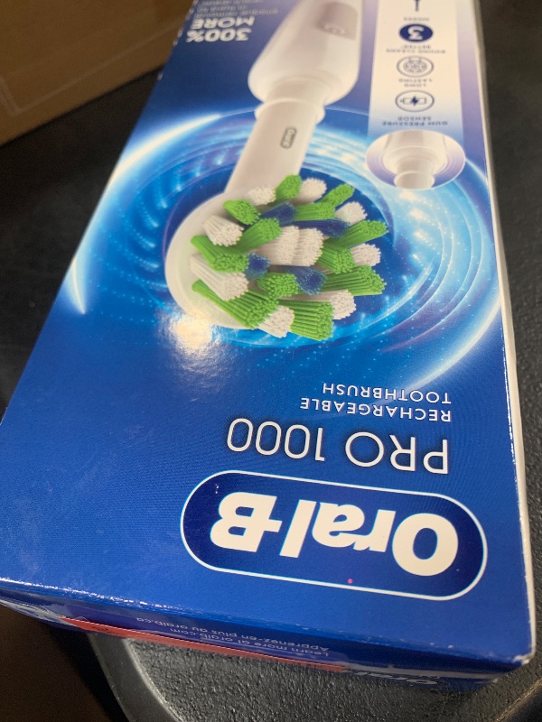 Photo 1 of Oral-B Pro 1000 Rechargeable Electric Toothbrush, White