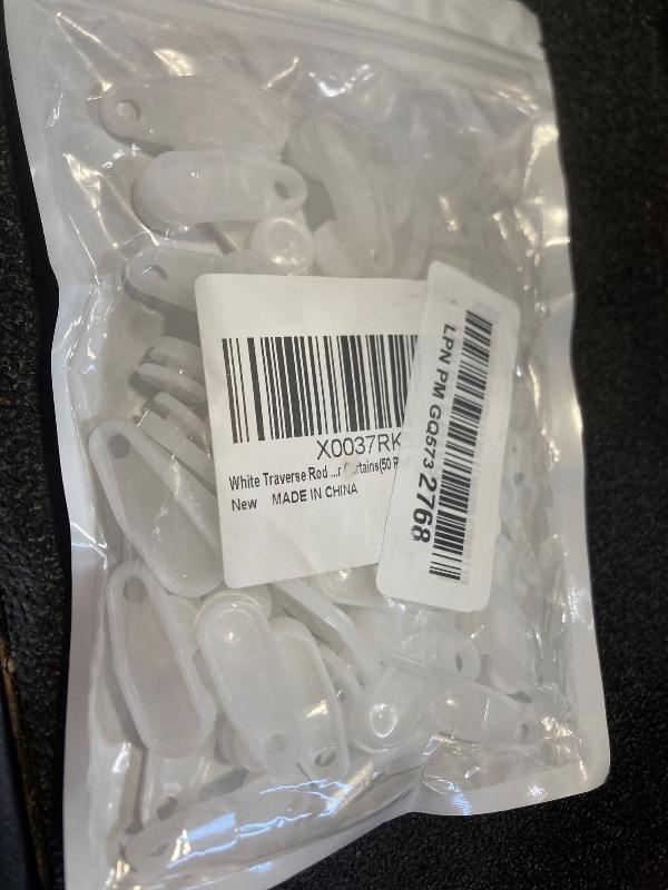 Photo 1 of White Traverse Rod Slides Curtain Track Glider Hooks for Curtains(50 Pack)…