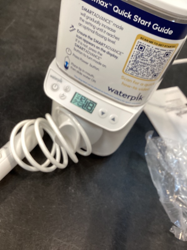 Photo 1 of Waterpik Promax Water Flosser with SmartAdvance Mode for Daily Gum Health and Cleaning Teeth, Braces, Implants, ADA Accepted, Small Quiet Design, Electric Flosser with 10 Settings, 5 Tips, WF-23