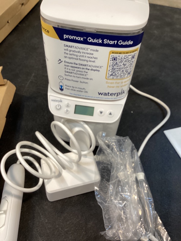 Photo 1 of Waterpik Promax Water Flosser with SmartAdvance Mode for Daily Gum Health and Cleaning Teeth, Braces, Implants, ADA Accepted, Small Quiet Design, Electric Flosser with 10 Settings, 5 Tips, WF-23
