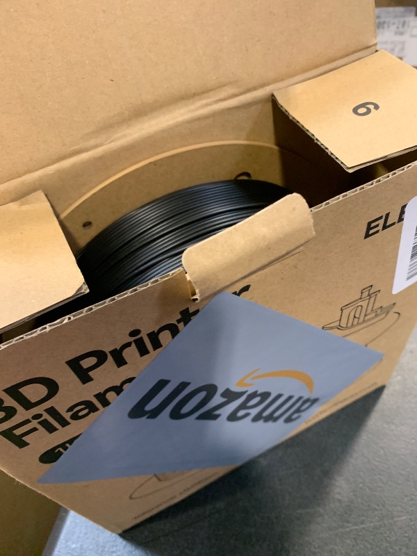 Photo 1 of ELEGOO PLA Filament 1.75mm Black 1KG, 3D Printer Filament Dimensional Accuracy +/- 0.02mm, 1kg Cardboard Spool(2.2lbs) 3D Printing Filament Fits for Most FDM 3D Printers