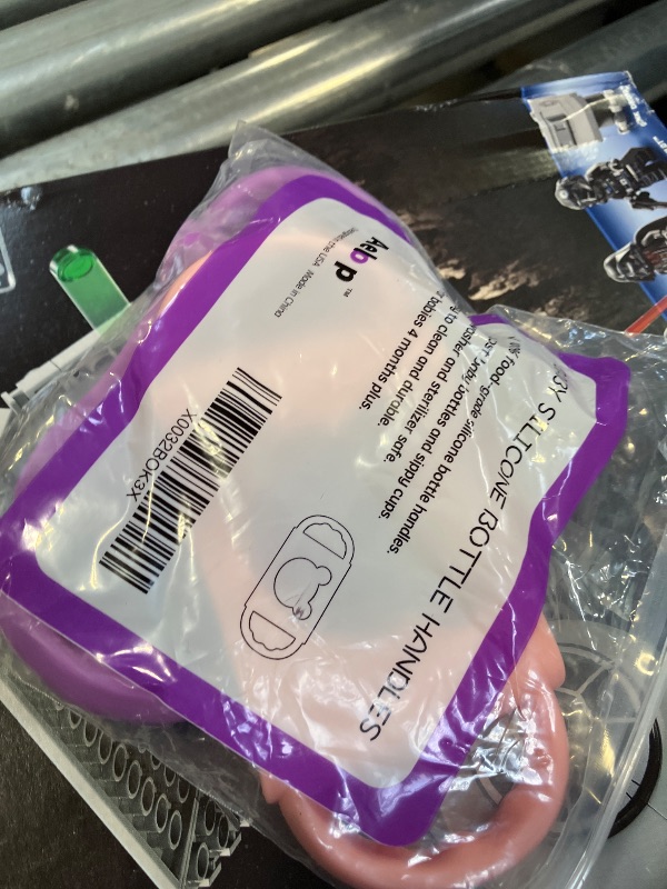Photo 1 of Aelop Silicone Bottle Handles for Wide-Neck Glass & Plastic Bottles, Transitional Sippy Cup Grip for Independent Drinking, Heat-Resistant, Latex-Free, Pink & Purple, 2-Pack