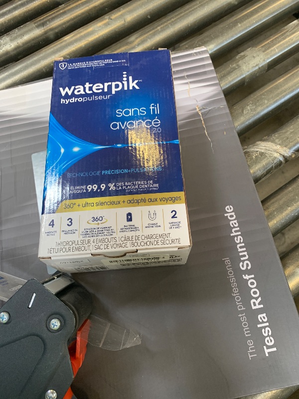 Photo 1 of Waterpik Cordless Advanced 2.0 Water Flosser For Teeth, Gums, Braces, Dental Care With Travel Bag and 4 Tips, ADA Accepted, Rechargeable, Portable, and Waterproof, Blue WP-583, Packaging May Vary
