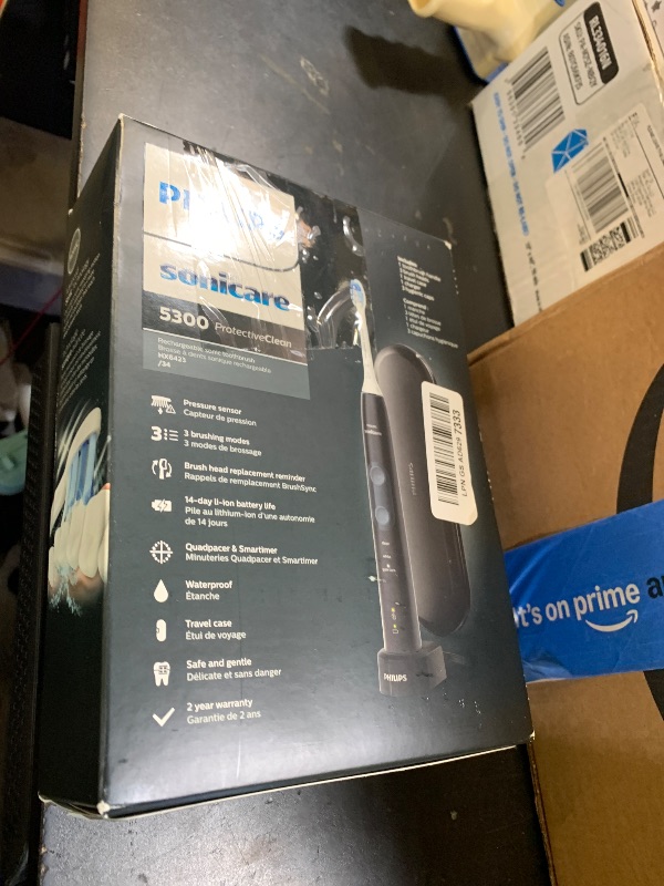 Photo 1 of Philips Sonicare ProtectiveClean 5300 Rechargeable Electric Toothbrush, with Pressure Sensor, 3 Cleaning Modes, SmarTimer and QuadPacer, with 2 Bonus Brush Heads, Travel Case, Black, Model HX6423/34